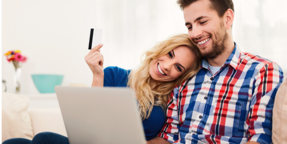 couple looking at the laptop screen