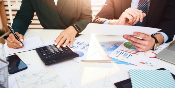 documents and calculator on the desk